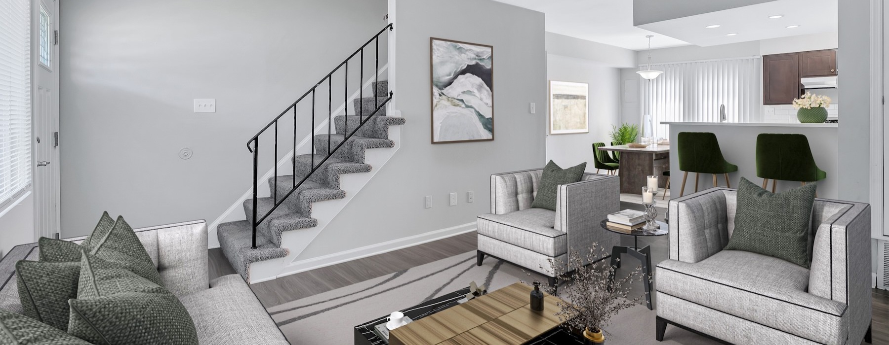 living room with seating table and stairwell